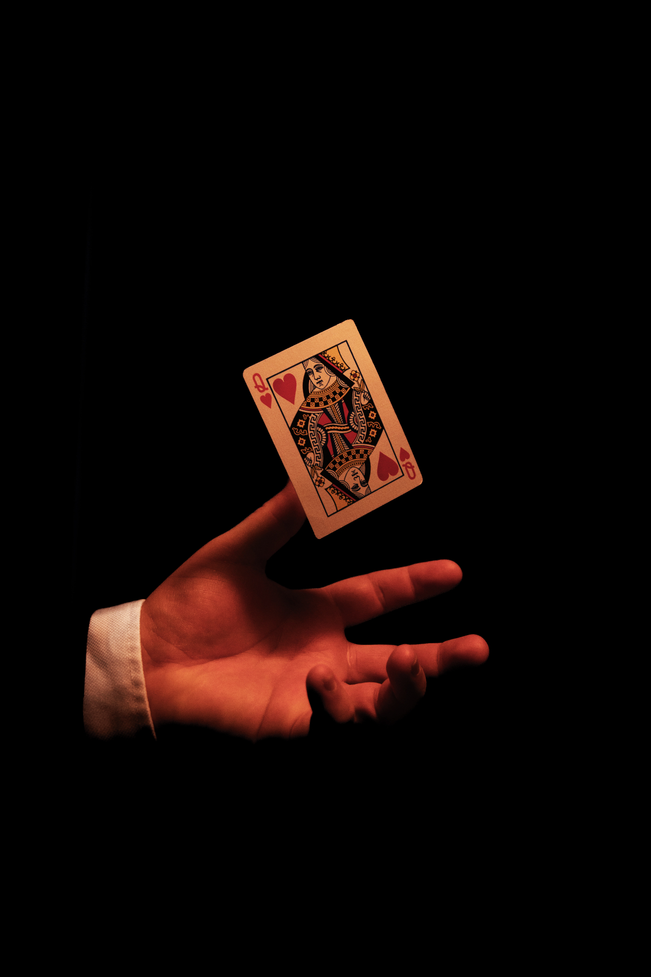 Close-up card magic at a destination event reception