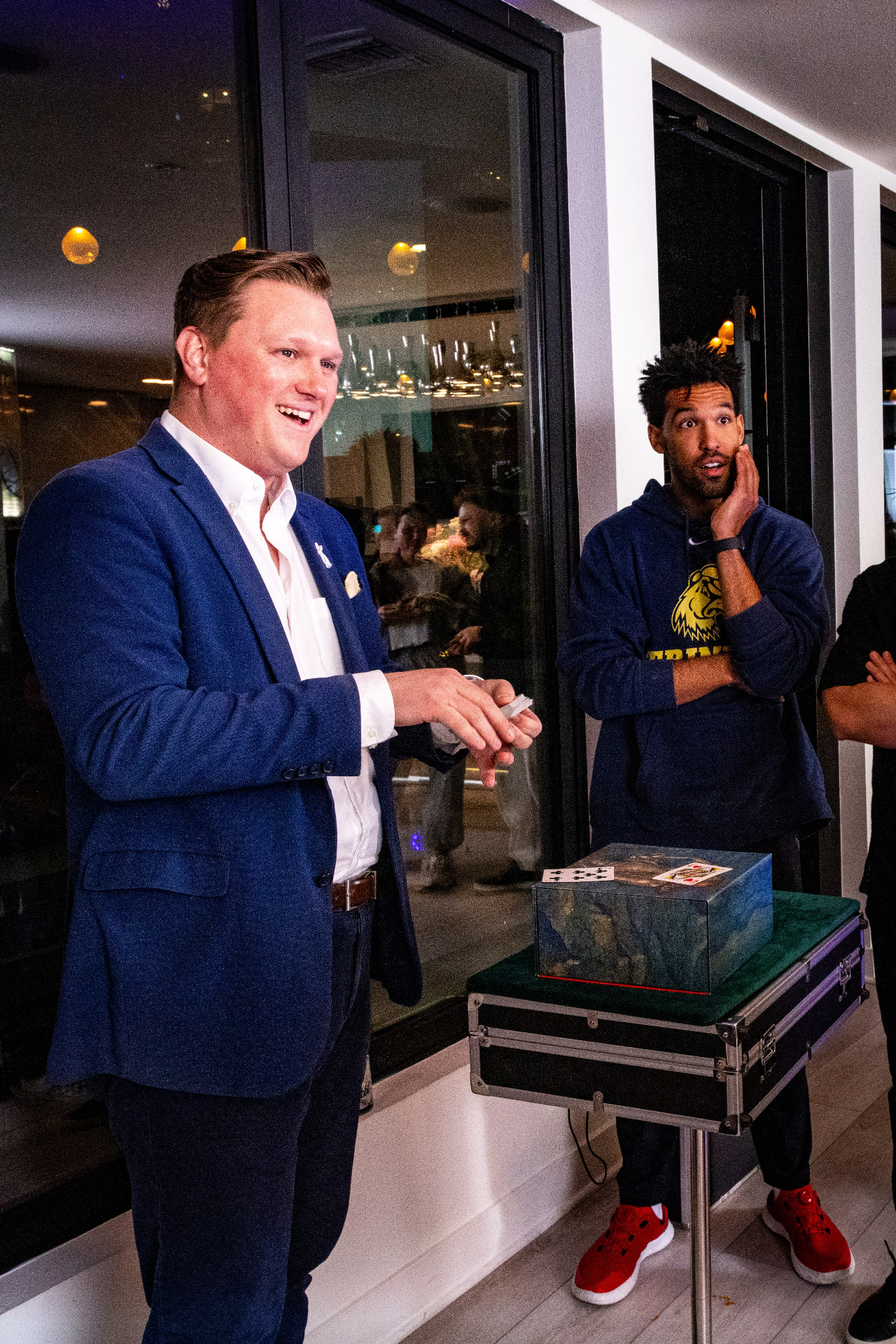 Scott Syme performing close-up magic at a corporate event