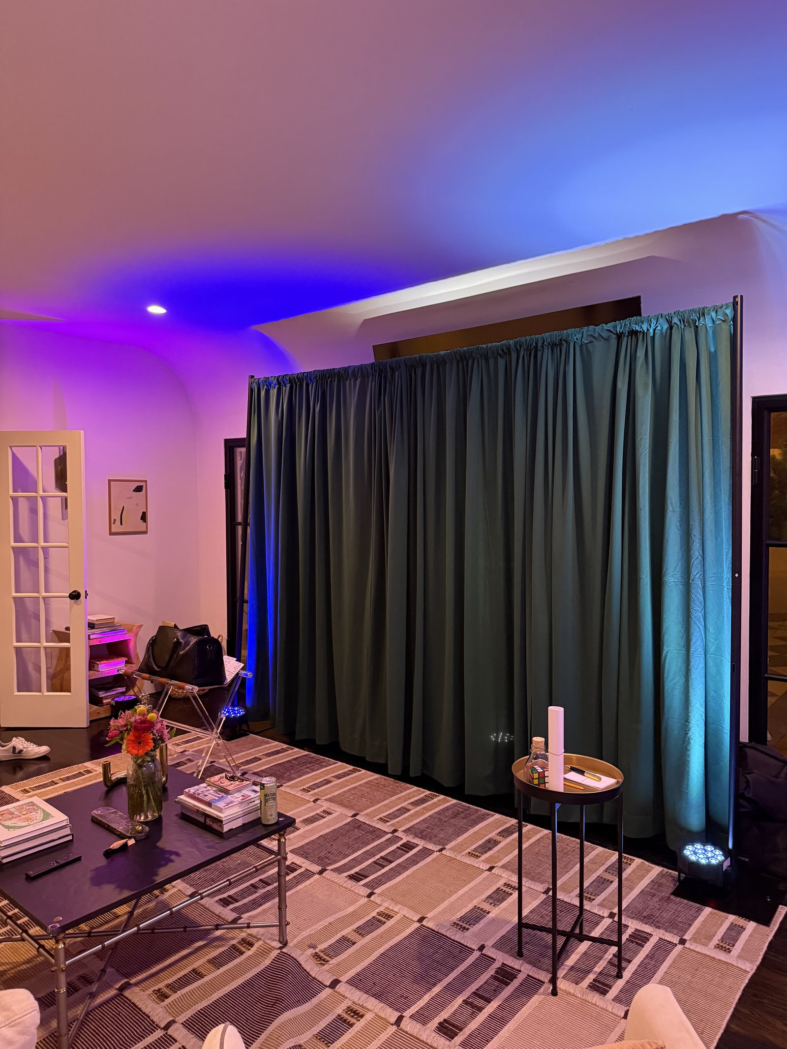 White Rabbit LA event setup with emerald drapes and cinematic lighting